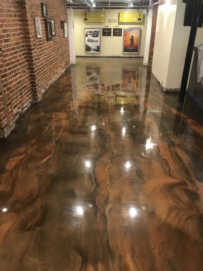 Copper metallic epoxy flooring in a commercial hallway in Hinesville, GA