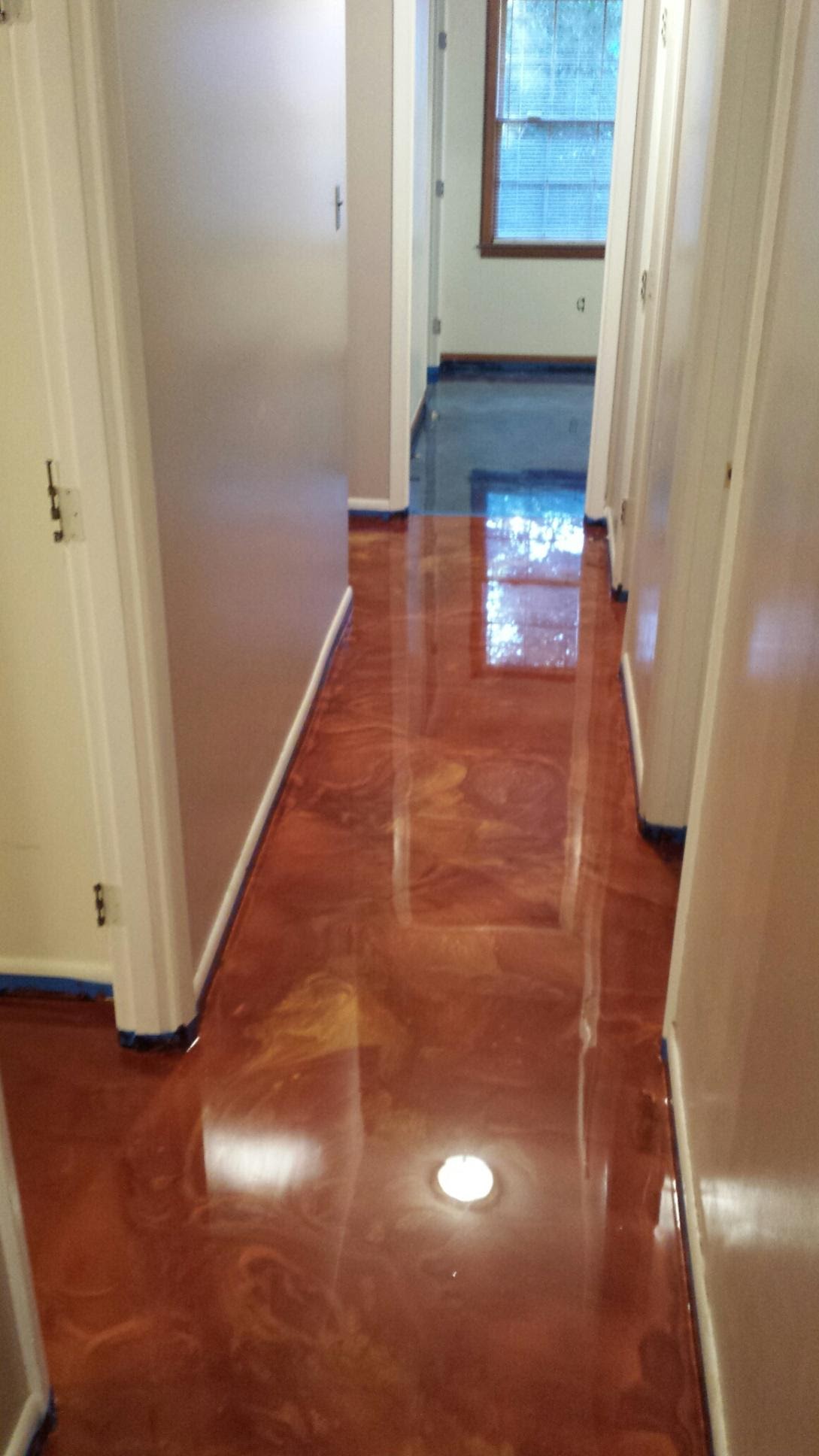 Copper metallic epoxy floor in residential hallway Hinesville GA