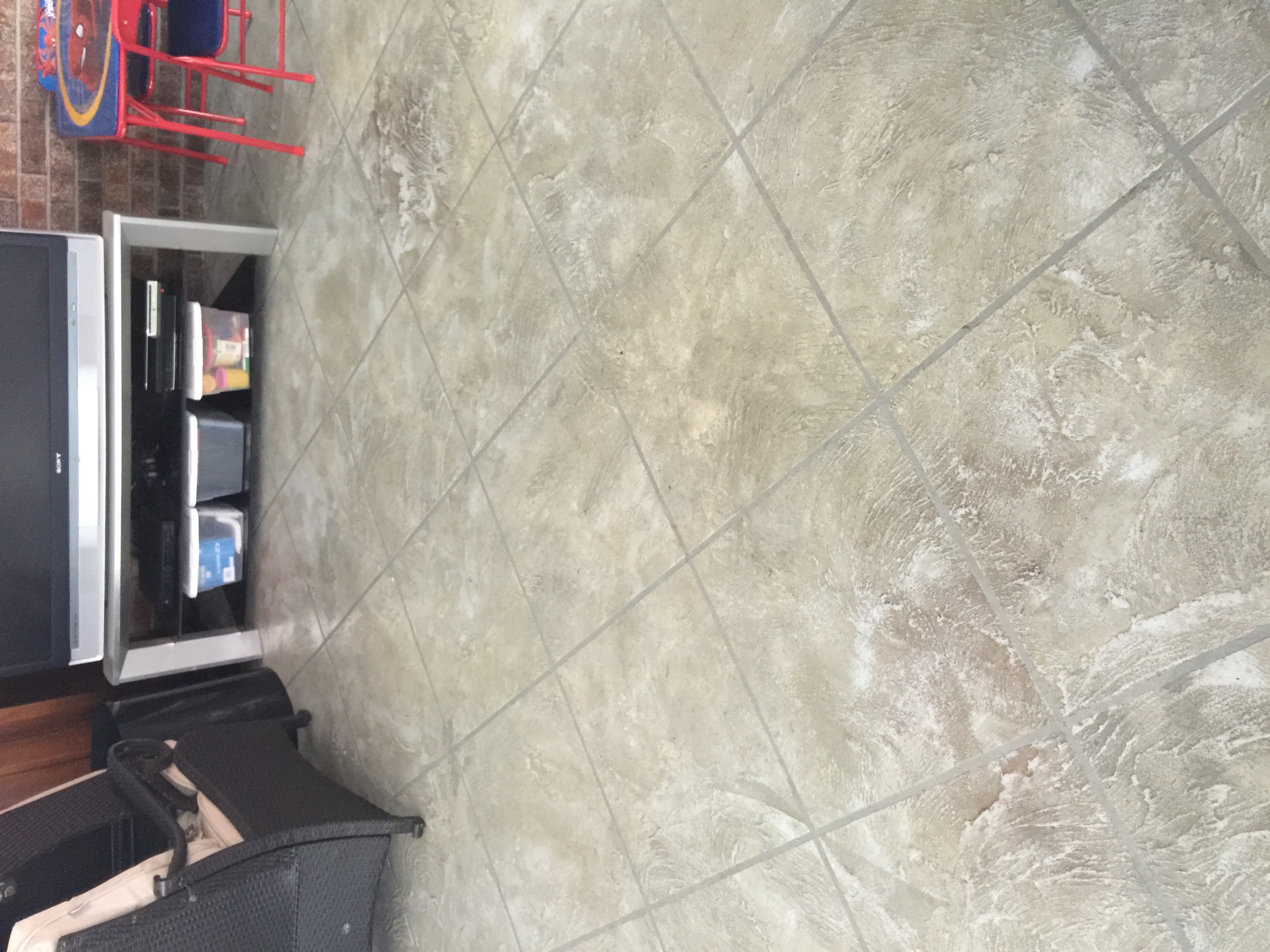Decorative tile pattern concrete floor in residential room Hinesville GA